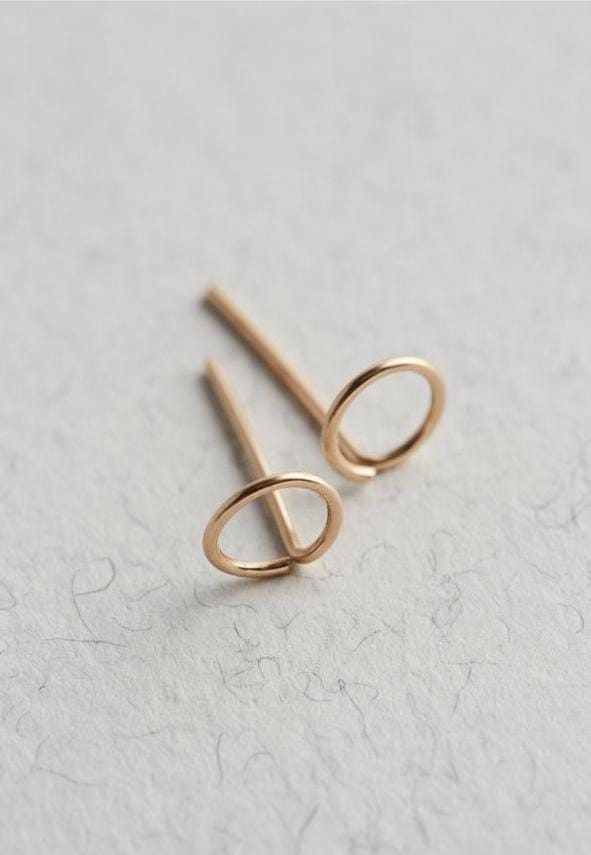 Gold stud earrings